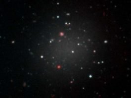 Dark matter missing in a galaxy far far away