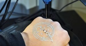 Researchers 3 D print electronics and cells directly on skin