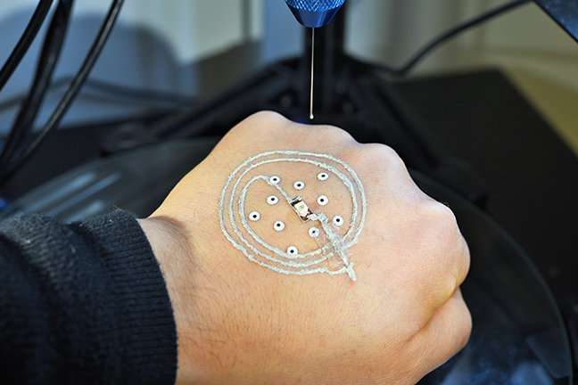 Researchers 3 D print electronics and cells directly on skin