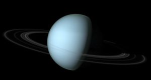 Astronomers see warm glow of Uranuss rings