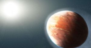 cropped Distant heavy metal gas planet is shaped like a football