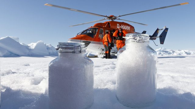 cropped Microplastic drifting down with the snow