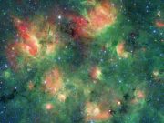 cropped Spitzer spots a starry region bursting with bubbles