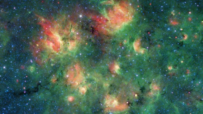 Spitzer spots a starry region bursting with bubbles cropped Spitzer spots a starry region bursting with bubbles