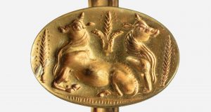 Archaeologists find Bronze Age tombs lined with gold scaled