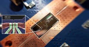 In leap for quantum computing silicon quantum bits establish a long distance relationship