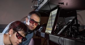 Laser pulse creates frequency doubling in amorphous dielectric material