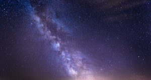 TESS dates an ancient collision with our galaxy