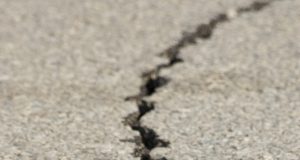 Timing of large earthquakes follows a devils staircase pattern