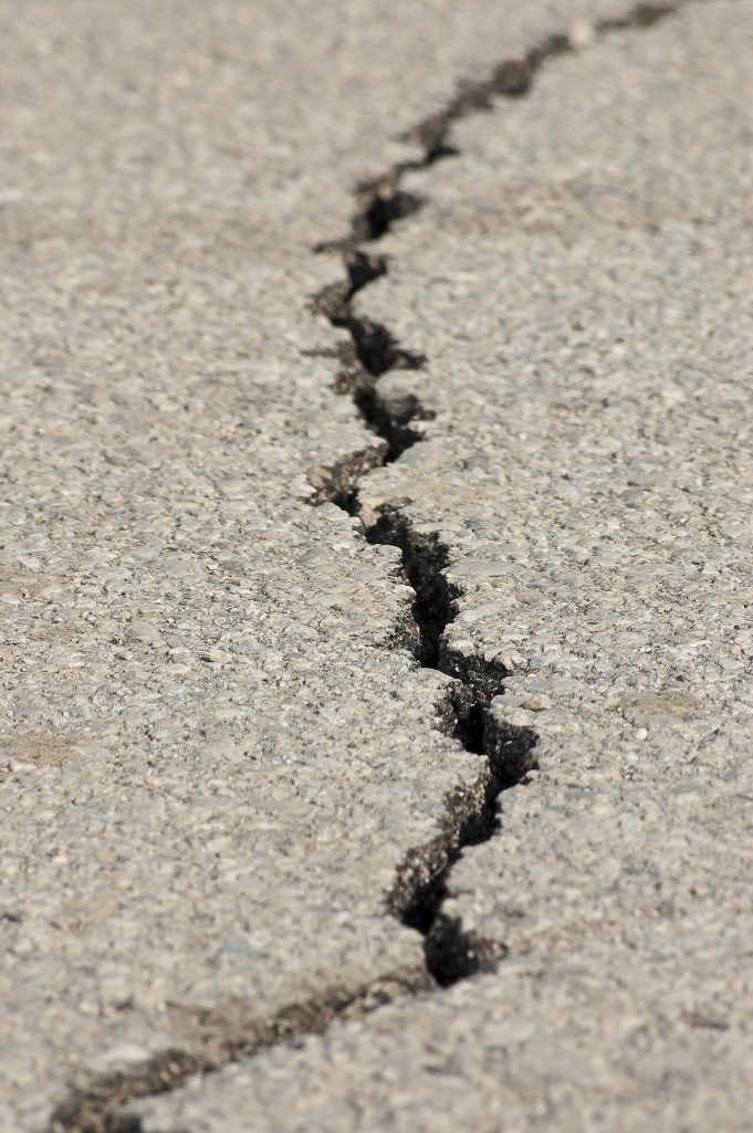 Timing of large earthquakes follows a devils staircase pattern