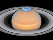 What makes Saturns atmosphere so hot