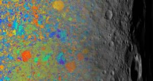 Ancient micrometeoroids carried specks of stardust water to asteroid 4 Vesta