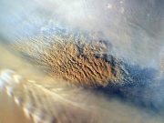 Electrically charged dust storms drive Martian chlorine cycle