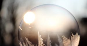 A quantum thermometer to measure the coldest temperatures in the universe Update