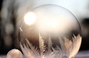 A quantum thermometer to measure the coldest temperatures in the universe Update