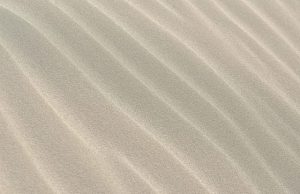 Glass molecules can act like sand when jammed study finds
