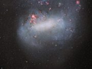 Dark energy camera snaps deepest photo yet of galactic siblings