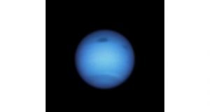 Dark storm on neptune reverses direction possibly shedding a fragment