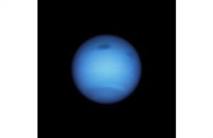 Dark storm on neptune reverses direction possibly shedding a fragment