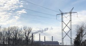 Shuttering fossil fuel power plants may cost less than expected